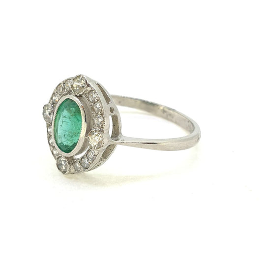 Oval Emerald and Diamond Cluster Ring in Platinum