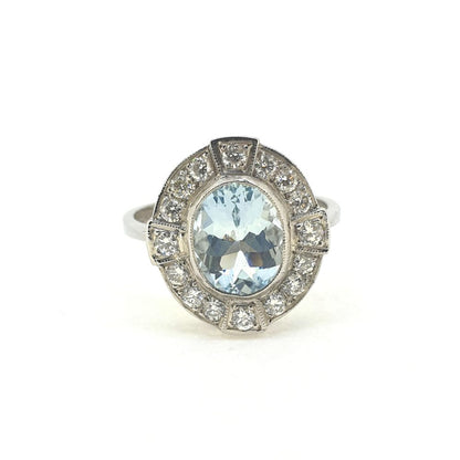 Modern 1.50ct Oval Aquamarine and Diamond Cluster Dress Ring in Platinum