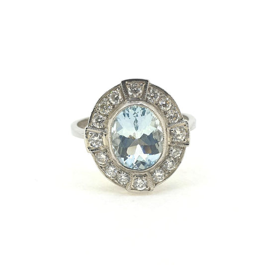 Modern 1.50ct Oval Aquamarine and Diamond Cluster Dress Ring in Platinum