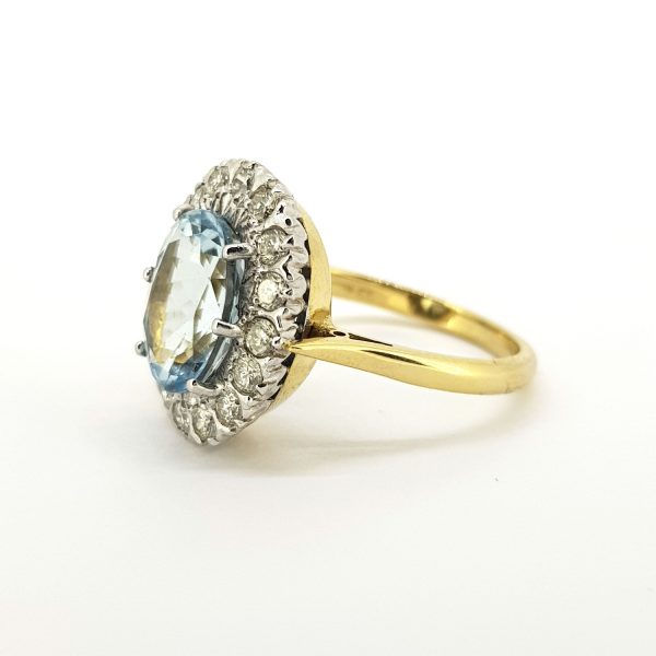 6.50ct Aquamarine and Diamond Oval Cluster Ring in 18ct Gold