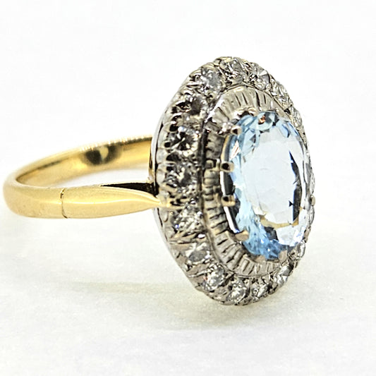 2.60ct Oval Aquamarine and Diamond Cluster Engagement Ring