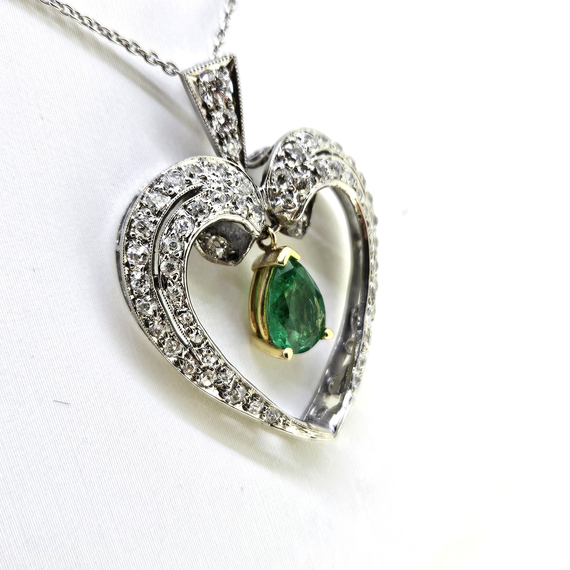 Pear Cut Emerald and Diamond Open Heart Cluster Pendant in Platinum
