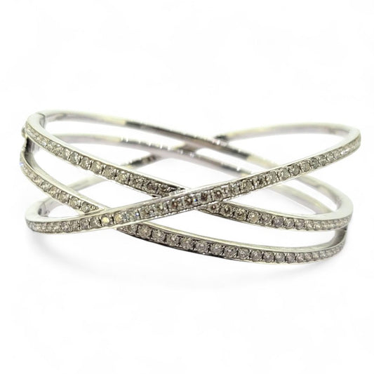 3.49ct Diamond Set 18ct White Gold Bangle Bracelet, 18ct white gold bangle composed of three criss-cross sections set with 3.49 carats of sparkling diamonds