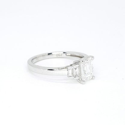 Emerald Cut Diamond Engagement Ring, central GIA certified 1.01 carat emerald-cut diamond flanked by graduated baguette-cut diamonds, in 18ct white gold, colour E clarity VS1
