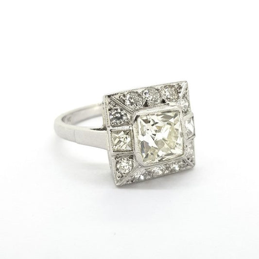 Art Deco Style Square Shaped Diamond Cluster Ring; central 1.74ct cushion-shaped diamond within a 0.85ct diamond surround with princess cut diamonds to the shoulders, in 18ct white gold