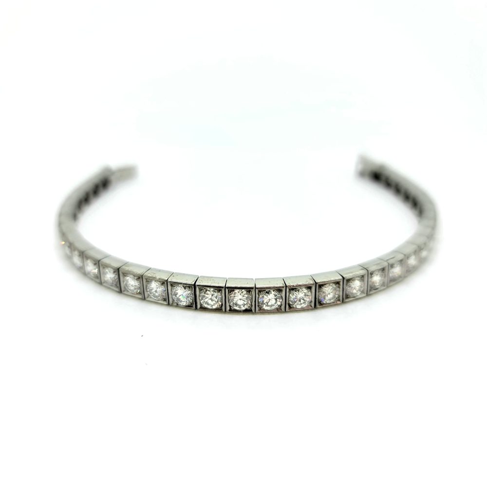 Diamond Line Bracelet in 18ct White Gold, 7 carat total, set with 36 G colour VS clarity round brilliant-cut diamonds in individual square settings in 18ct white gold