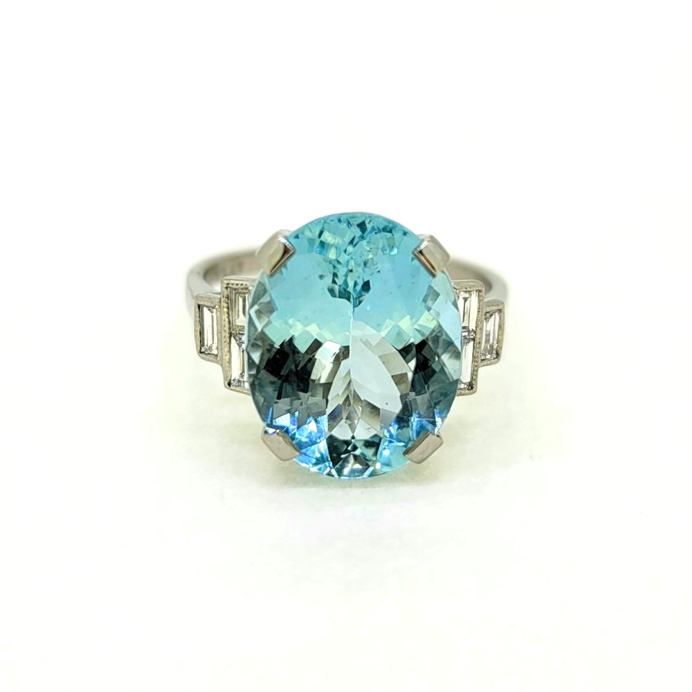 7ct Oval Aquamarine Solitaire Ring with Baguette Diamond Shoulders in Platinum