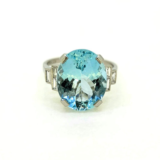 7ct Oval Aquamarine Solitaire Ring with Baguette Diamond Shoulders in Platinum