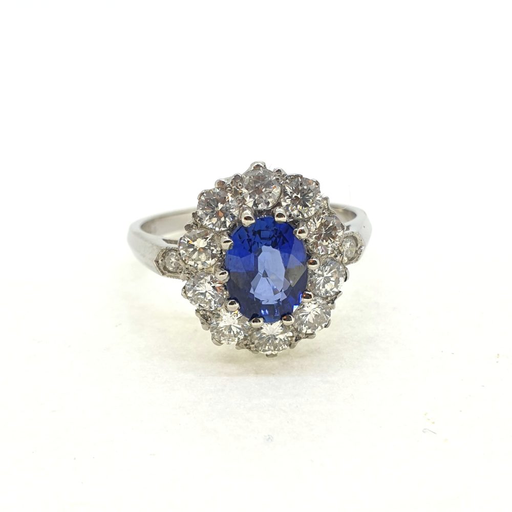 1.50ct Oval Blue Sapphire and Diamond Cluster Engagement Ring
