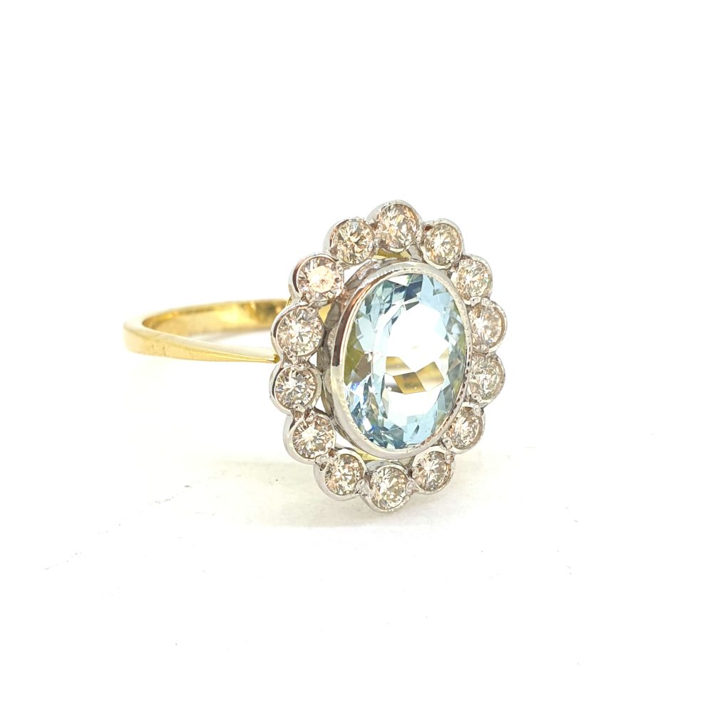 1.70ct Oval Aquamarine and Diamond Cluster Ring