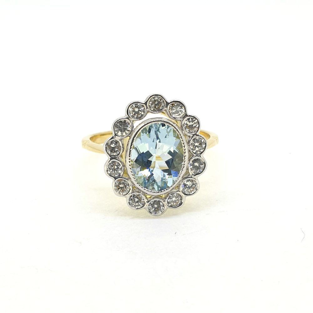 1.40ct Oval Aquamarine and Diamond Cluster Ring