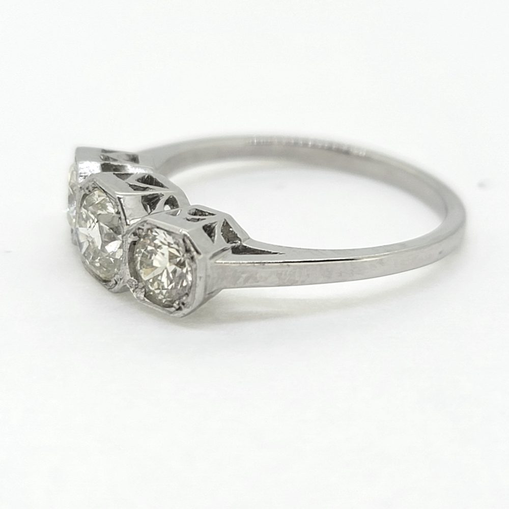 Three Stone Diamond Engagement Ring in Platinum, 1.25 carat timeless diamond trilogy ring set with three sparkling diamonds in octagonal platinum settings