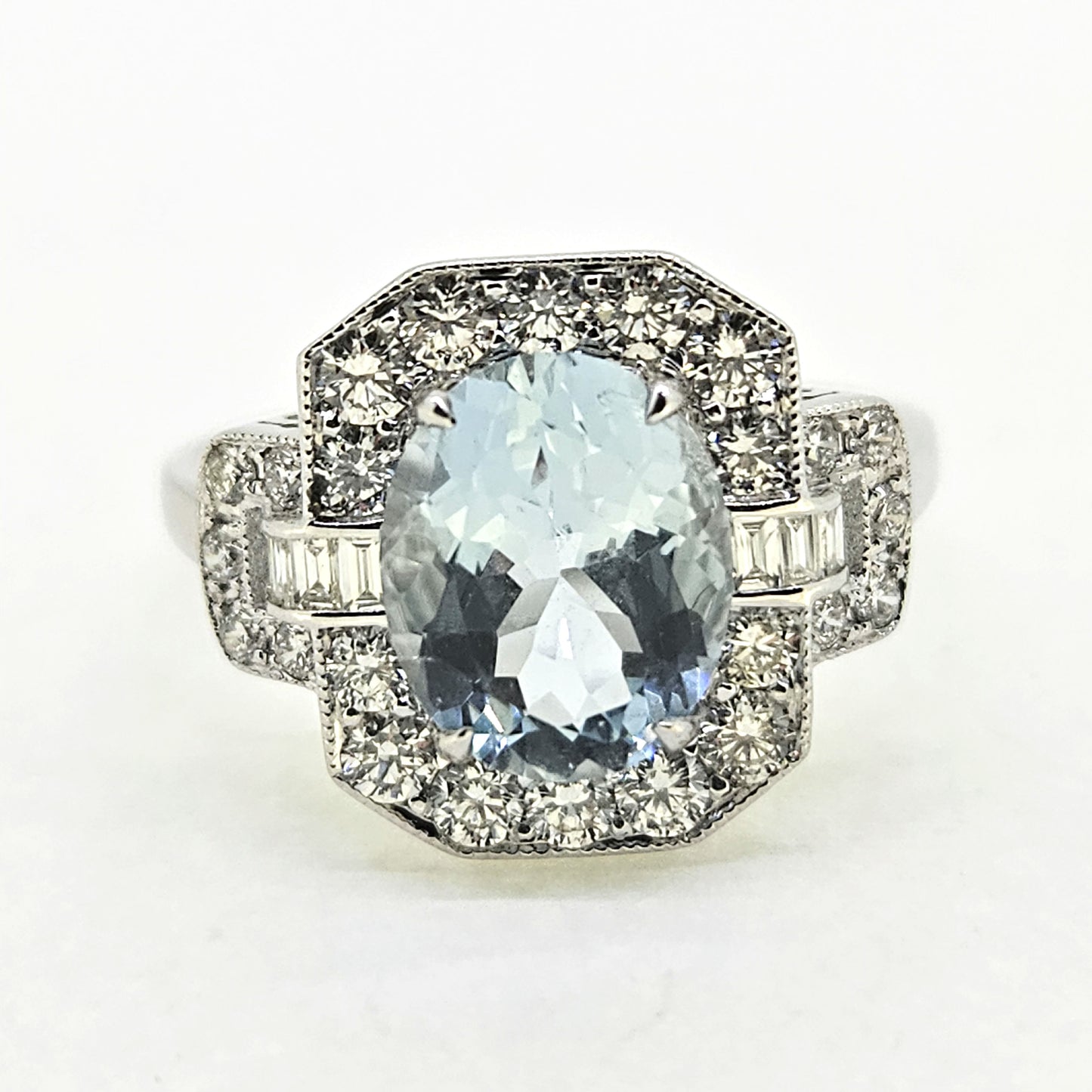 1.77ct Oval Aquamarine and Diamond Cluster Buckle Dress Ring