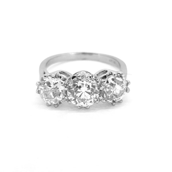 Old Cut Diamond Three Stone Ring in Platinum, 3.52 carat total, colour H, clarity SI1