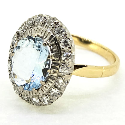 2.60ct Oval Aquamarine and Diamond Cluster Engagement Ring