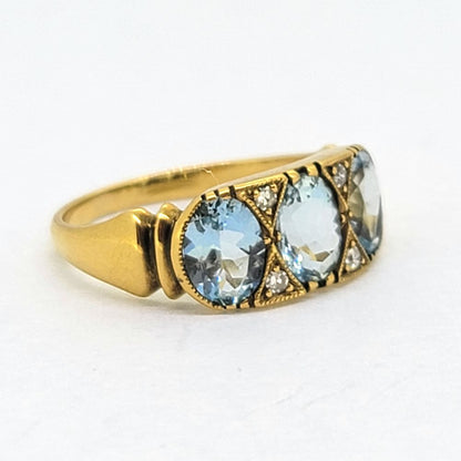 Aquamarine Three Stone Ring in 18ct Yellow Gold with Diamond Accents