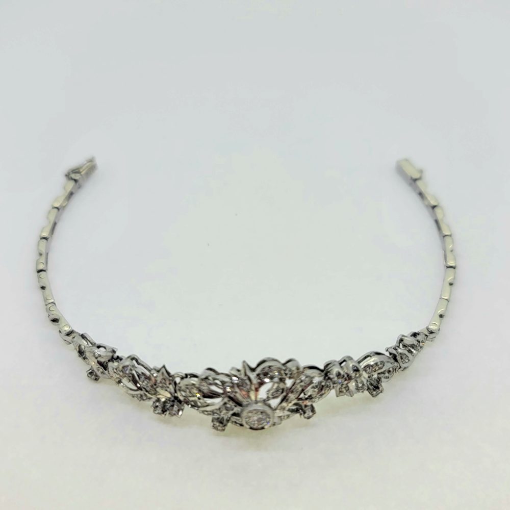 1ct Diamond Floral Bracelet in 18ct White Gold, elegant diamond bracelet composed of 18ct white gold floral scroll design studded with diamonds