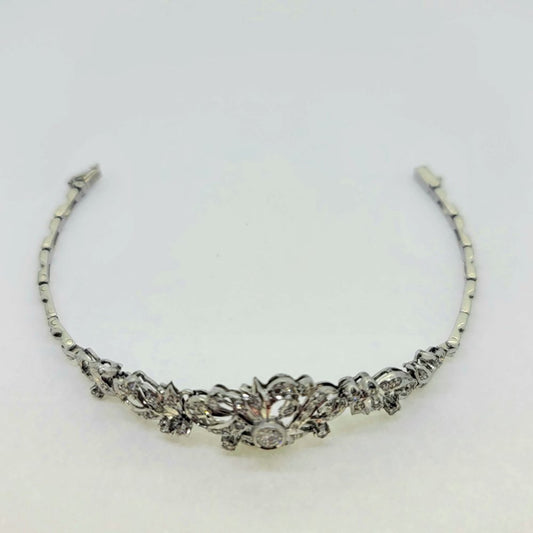 1ct Diamond Floral Bracelet in 18ct White Gold, elegant diamond bracelet composed of 18ct white gold floral scroll design studded with diamonds