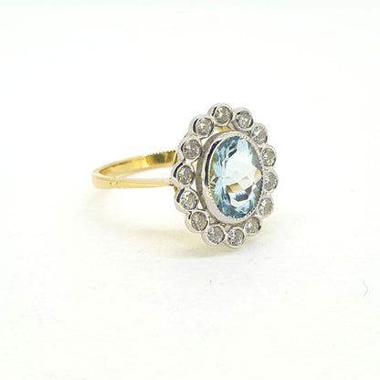 1.40ct Oval Aquamarine and Diamond Cluster Ring