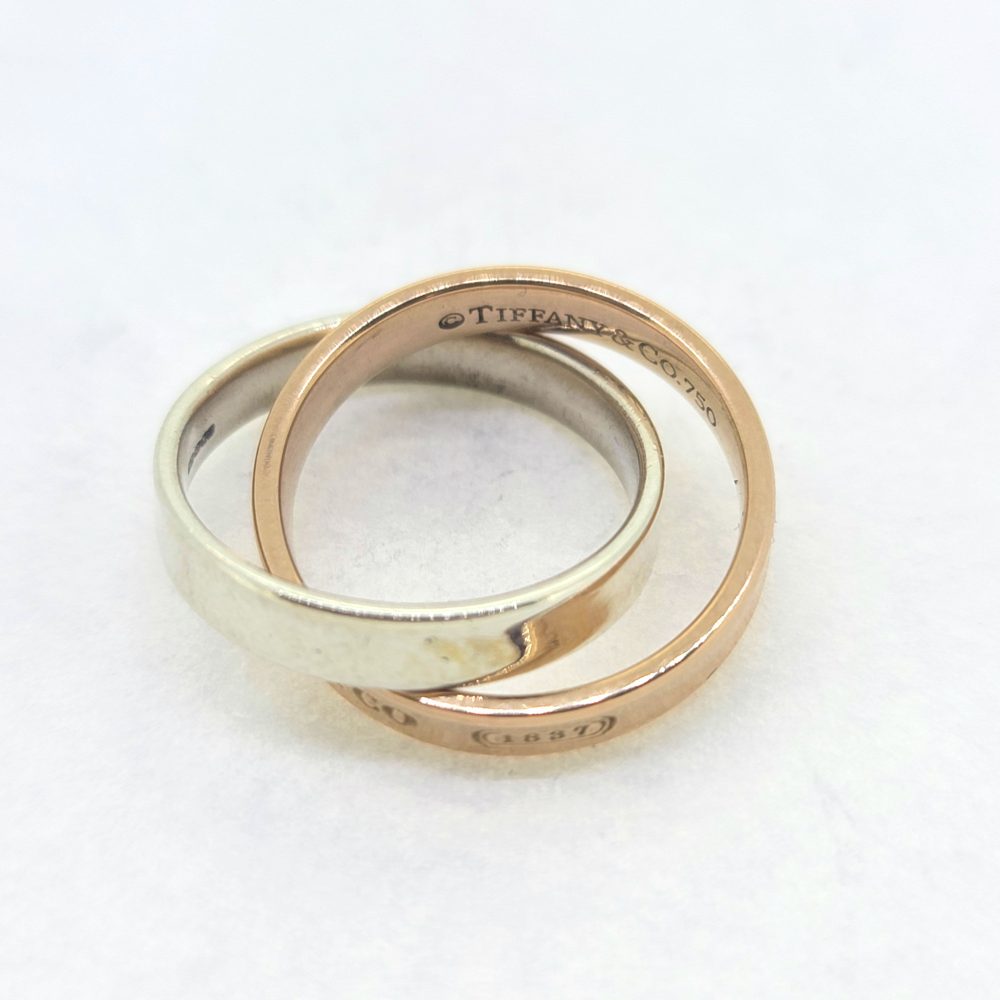 Preloved Tiffany and Co Interlocking Circles Gold Ring, reminiscent of classic Russian wedding band design composed of two interlocking bi-colour 18ct gold rings
