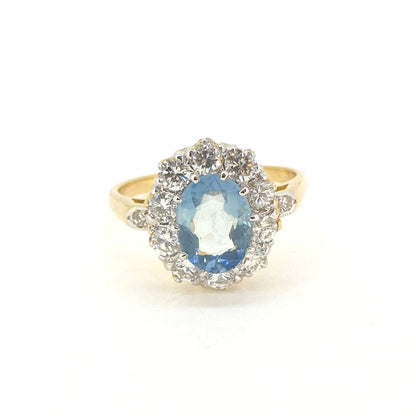 0.80ct Oval Aquamarine and Diamond Cluster Engagement Ring in 18ct Yellow Gold