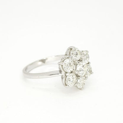 Diamond Daisy Floral Cluster Ring; seven round brilliant-cut diamonds, 2.30 carat total, claw-set and mounted to a plain 18ct white gold shank