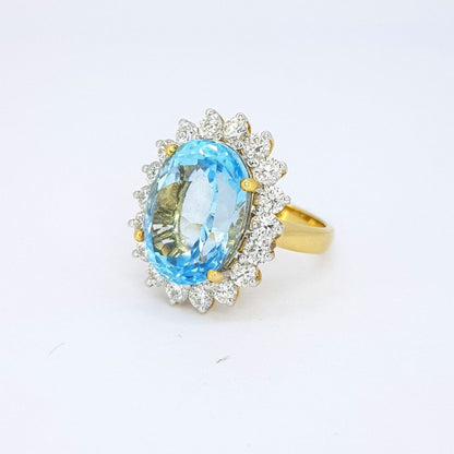 Blue Topaz and Diamond Oval Cluster Ring in 18ct Gold, 14.00 carats