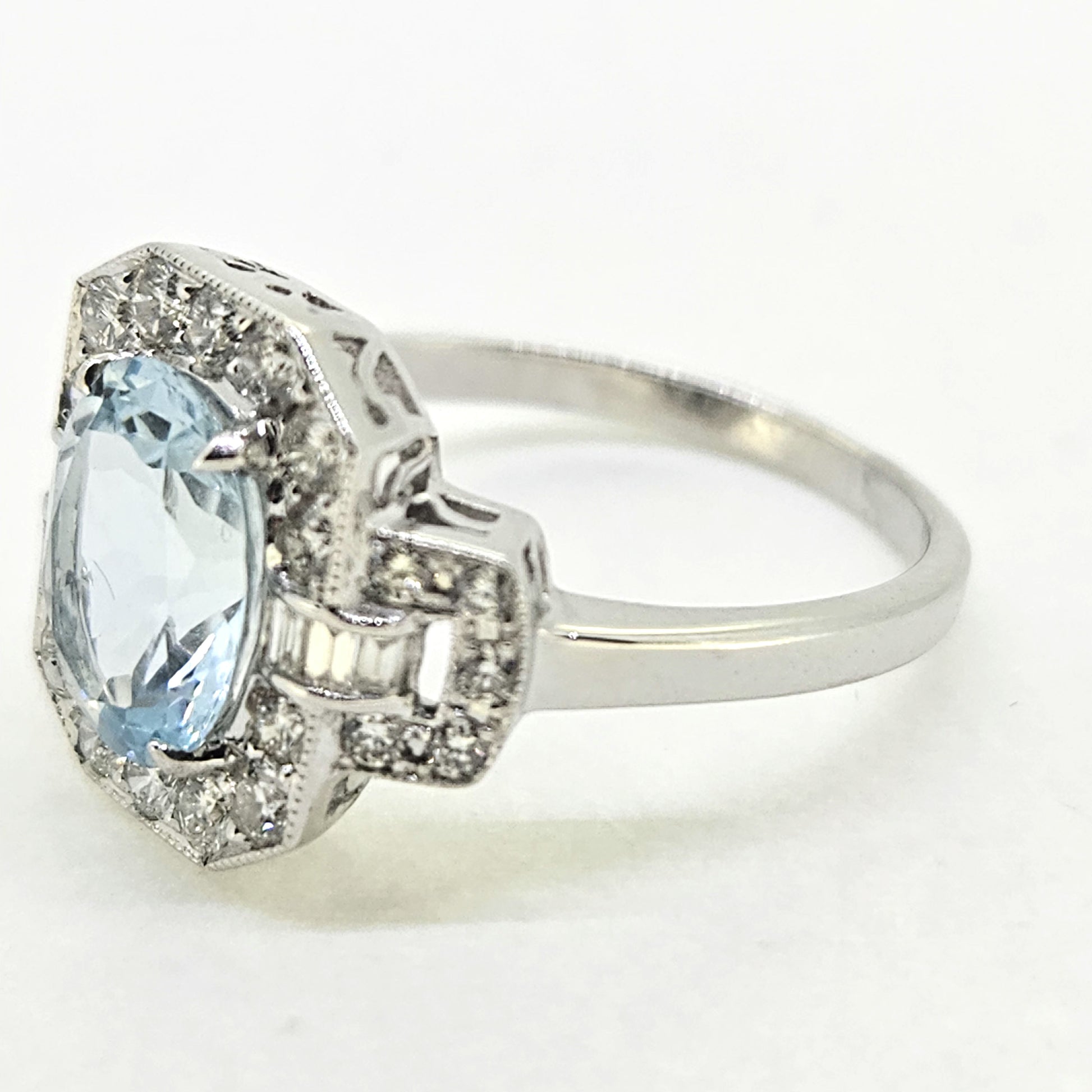 1.77ct Oval Aquamarine and Diamond Cluster Buckle Dress Ring