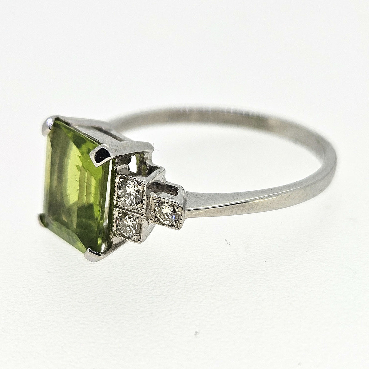 Art Deco Style Platinum Peridot 2.30 Carats and Diamond 0.12 Carat Ring