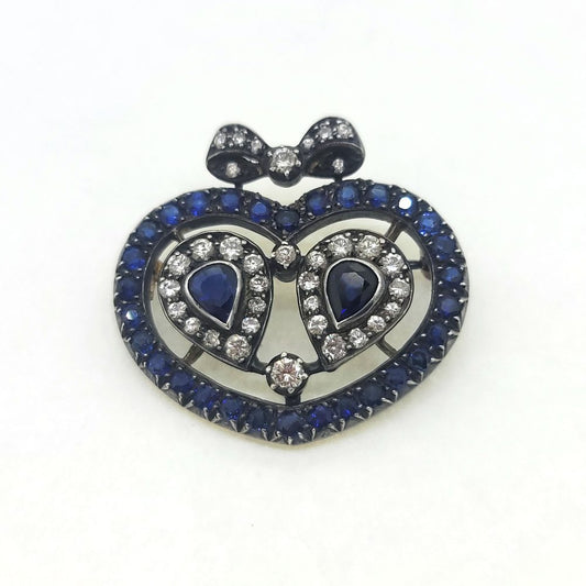 Victorian Antique Sapphire and Diamond Heart Bow Brooch, Two central pear cut sapphire and diamond clusters within sapphire heart shaped surround topped with diamond bow