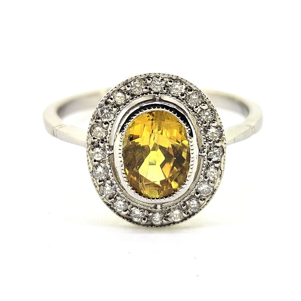1.90ct Oval Yellow Sapphire and Diamond Halo Cluster Engagement Ring in Platinum