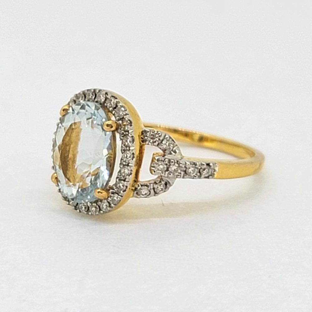 2.30ct Oval Aquamarine and Diamond Cluster Engagement Ring in 18cy Yellow Gold