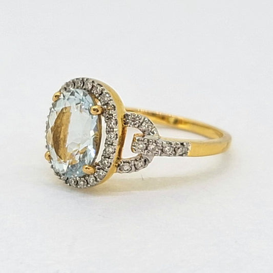 2.30ct Oval Aquamarine and Diamond Cluster Engagement Ring in 18cy Yellow Gold