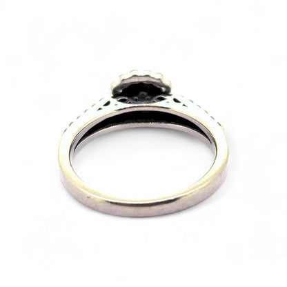 Diamond Halo Cluster Engagement Ring, central diamond surrounded by double border of diamonds in 18ct gold with two rows of diamonds to each shoulder