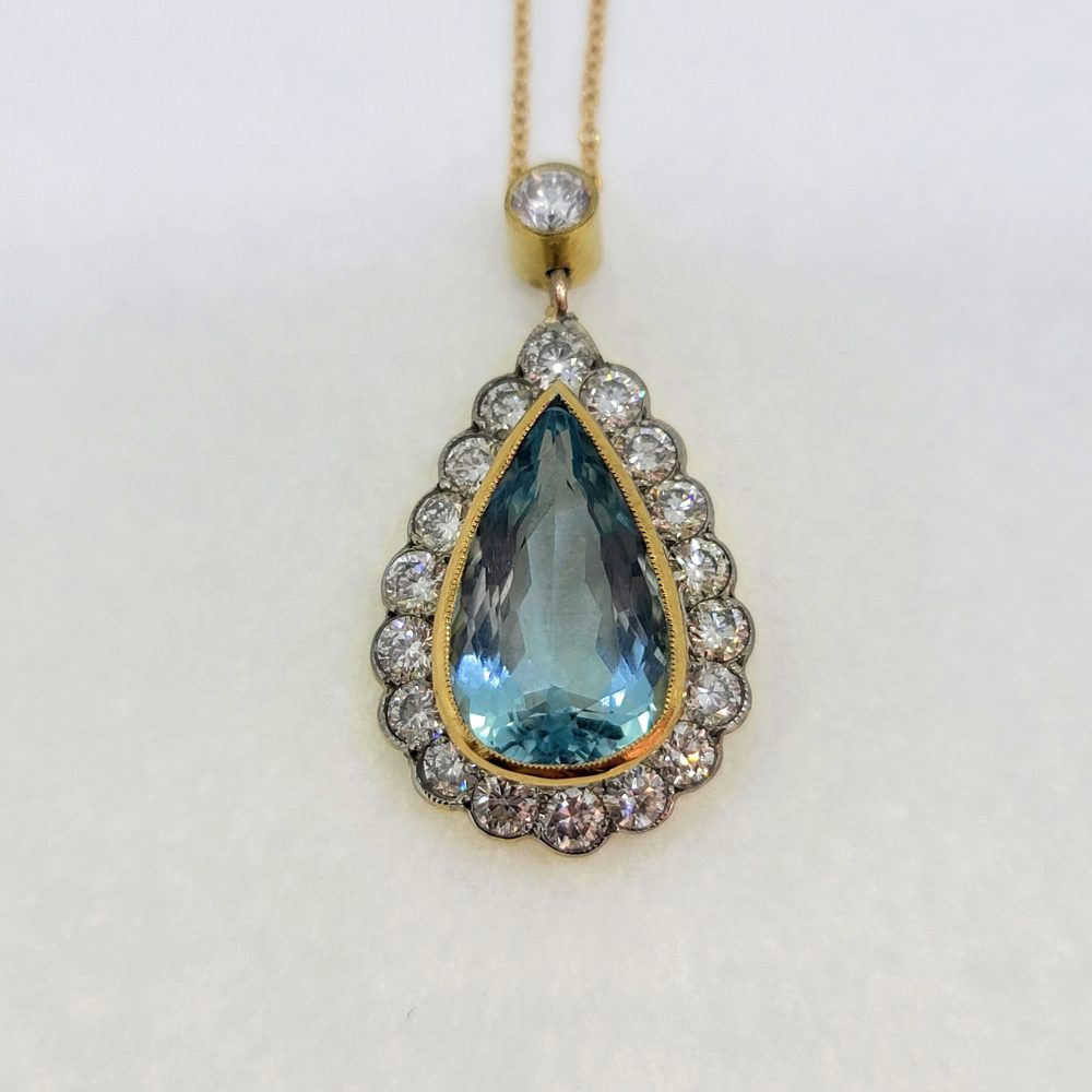 4.75ct Pear Cut Aquamarine and Diamond Cluster Pendant