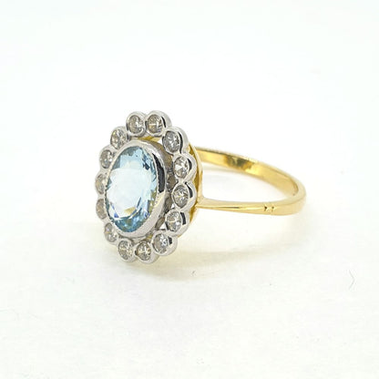 1.40ct Oval Aquamarine and Diamond Cluster Ring