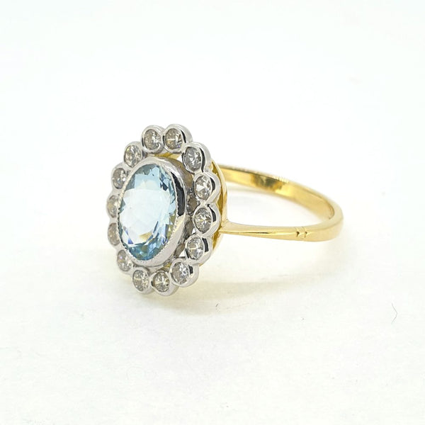 1.40ct Oval Aquamarine and Diamond Cluster Ring