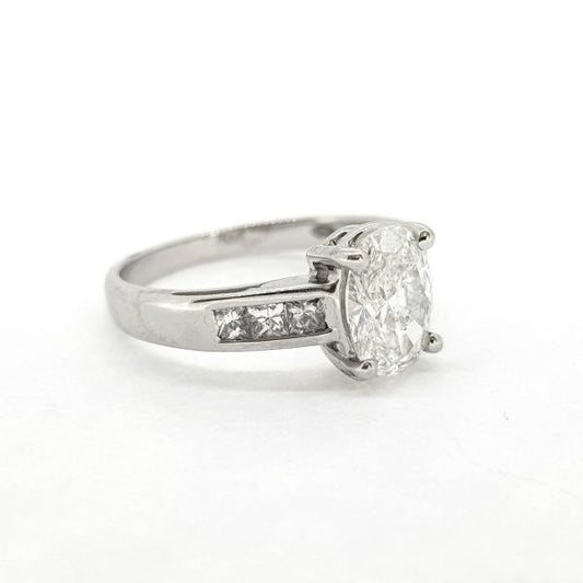 1.22ct Oval Cut Diamond Engagement Ring with Princess Cut Diamond Shoulders
