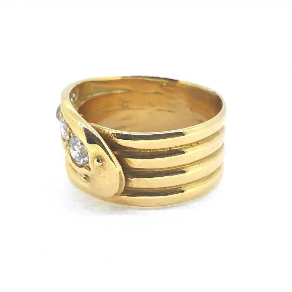 18ct coiled snake ring with diamonds