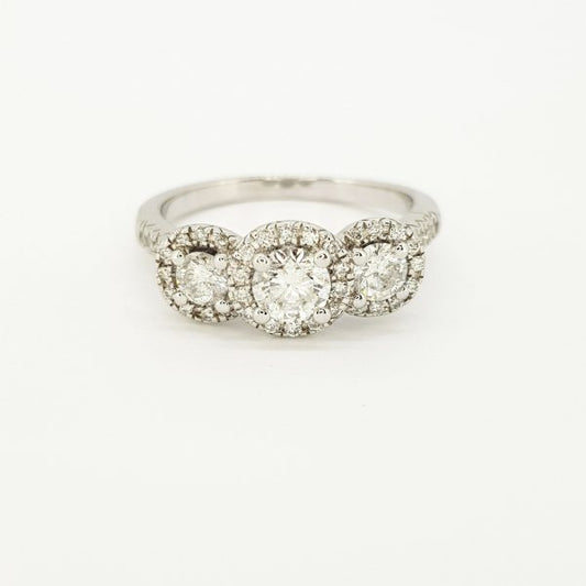 Three Stone Diamond Cluster Ring in 18ct White Gold, 1.00 carat total, featuring three brilliant cut diamonds all within diamond surrounds and diamond set shoulders