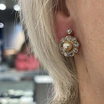 Natural Pearl and Diamond Cluster Earrings, pair of pearl and diamond cluster earrings showcasing central natural pearls with diamond surrounds in 18ct yellow gold