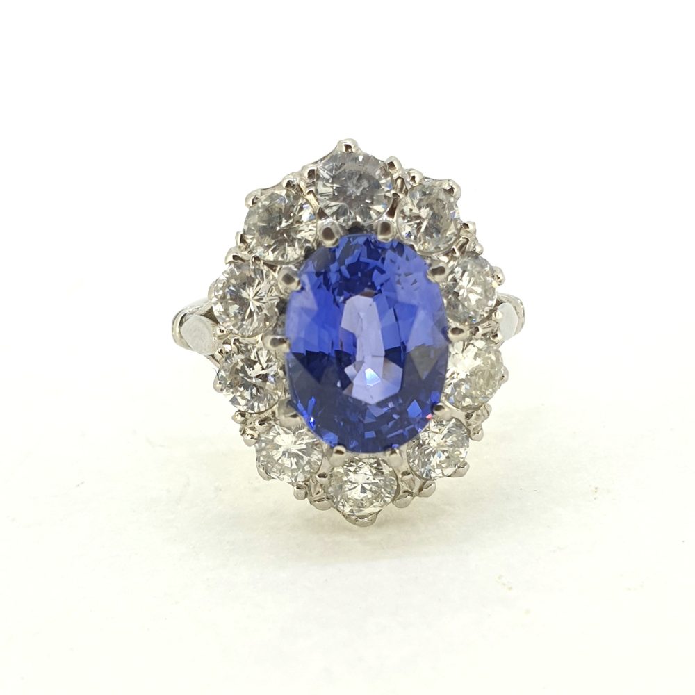KEEP AS PRIVATE 4.5ct Sapphire and Diamond Oval Cluster Ring in Platinum