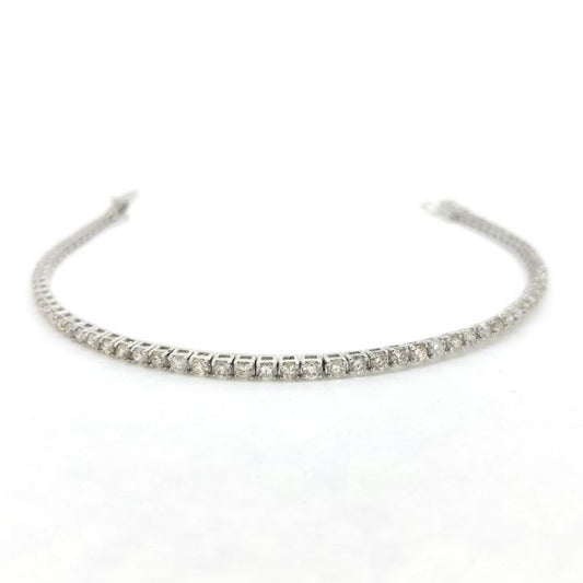 Diamond Line Tennis Bracelet; set with 2.95 carats of round brilliant-cut diamonds, claw-set and mounted in 18ct white gold