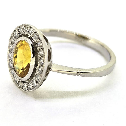 1.90ct Oval Yellow Sapphire and Diamond Halo Cluster Engagement Ring in Platinum