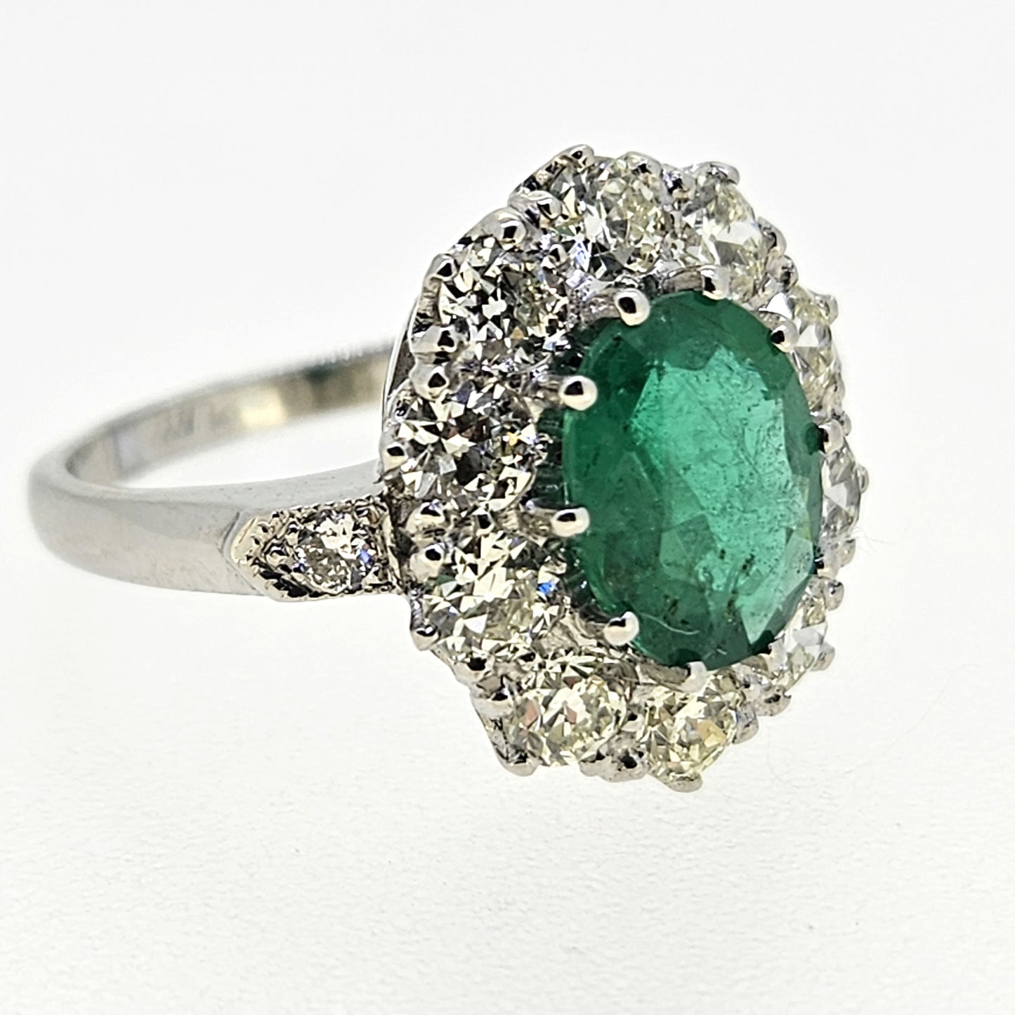 1.40ct Oval Emerald and Diamond Cluster Cluster Engagement Ring in Platinum
