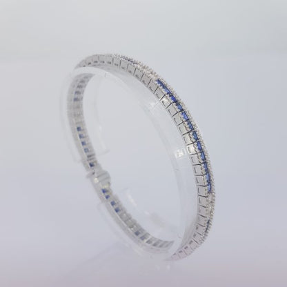 Princess Cut Sapphire and Diamond Line Bracelet in 18ct white gold. Sapphires 7.03 carats. Diamonds 2.21 carats