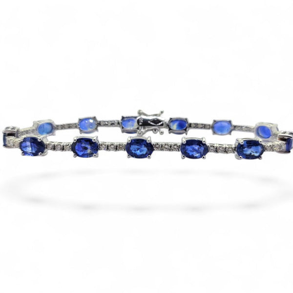 13.8ct Oval Sapphire and Diamond Line Bracelet, comprising 13 oval sapphires and 39 round diamonds in 18ct white gold