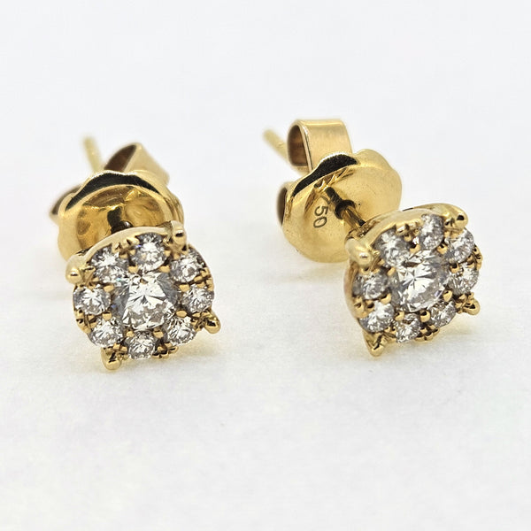 Diamond cluster studs earrings in 18ct yellow gold, on a white background