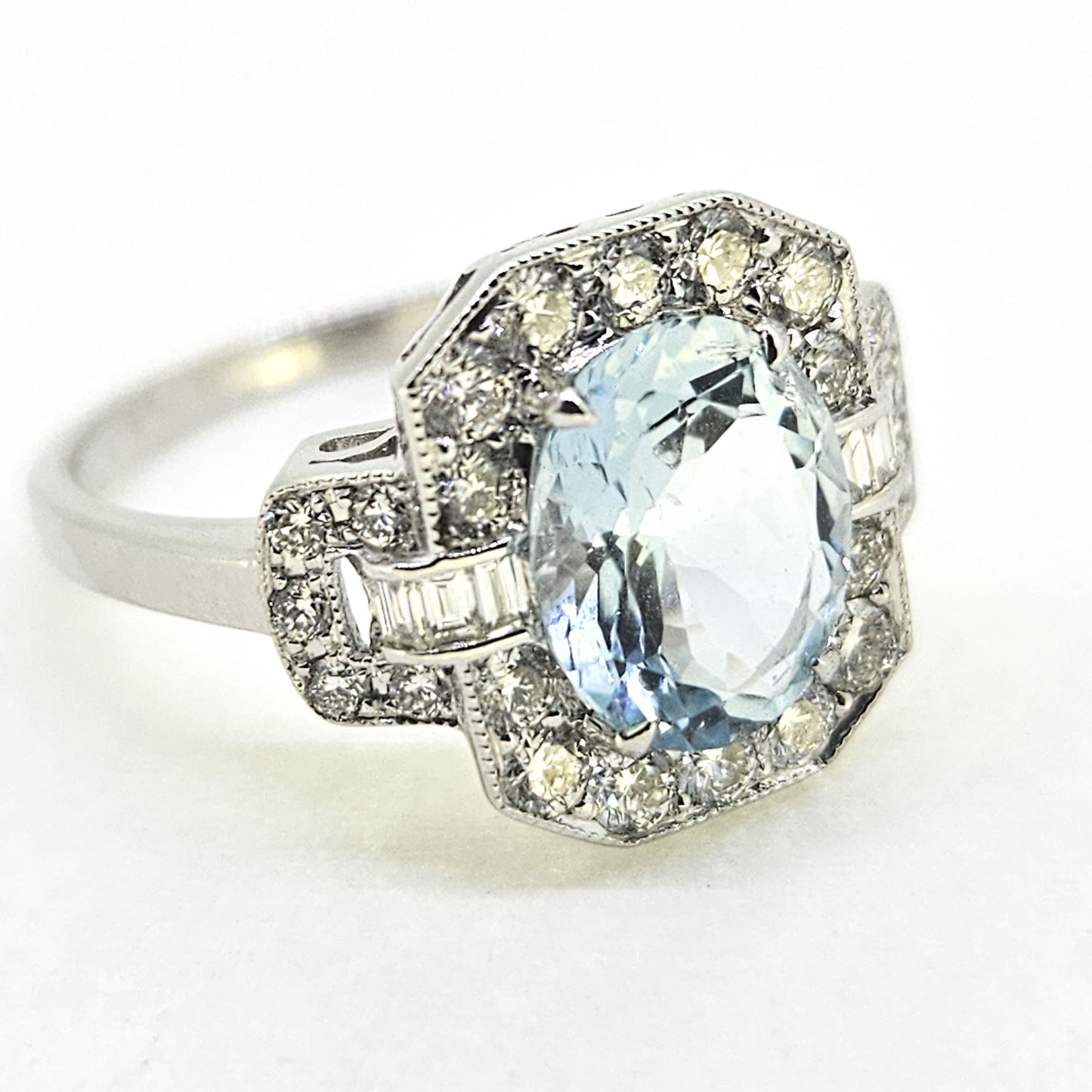 1.77ct Oval Aquamarine and Diamond Cluster Buckle Dress Ring