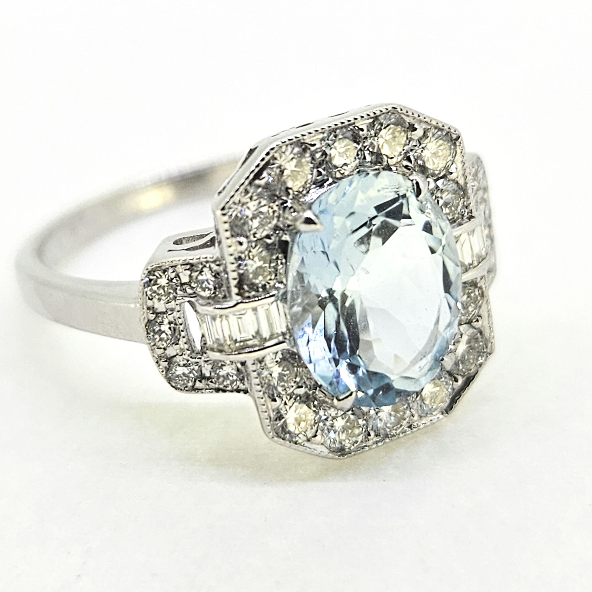 1.77ct Oval Aquamarine and Diamond Cluster Buckle Dress Ring